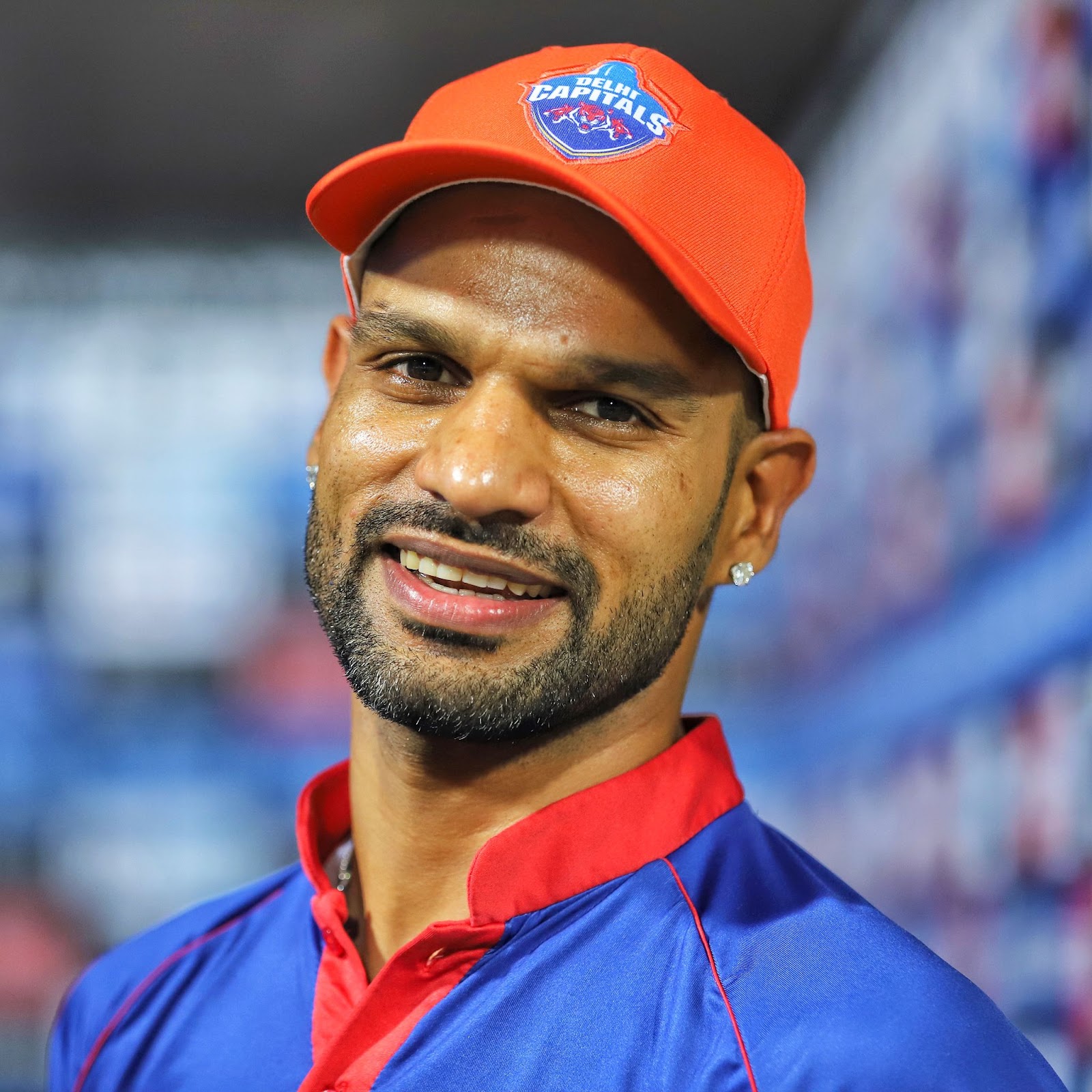 Shikhar Dhawan pictured with the orange cap atop his head