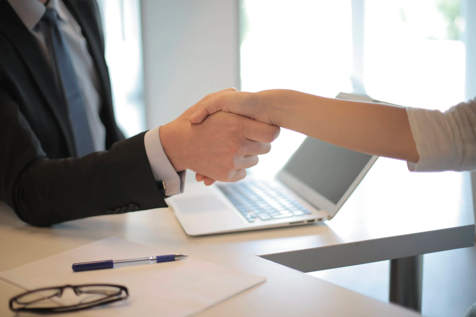 job seeker and employer shaking hands