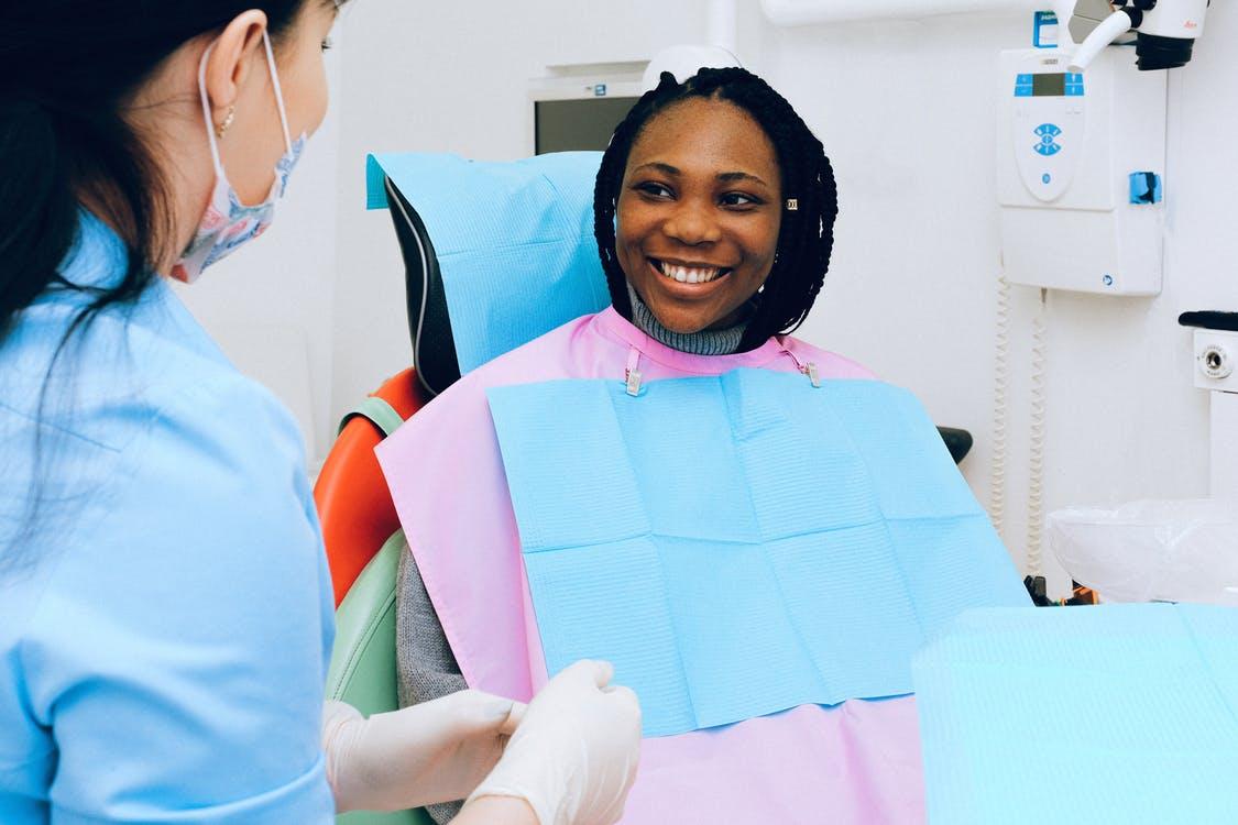 Free Woman Having a Dental Check-up Stock Photo