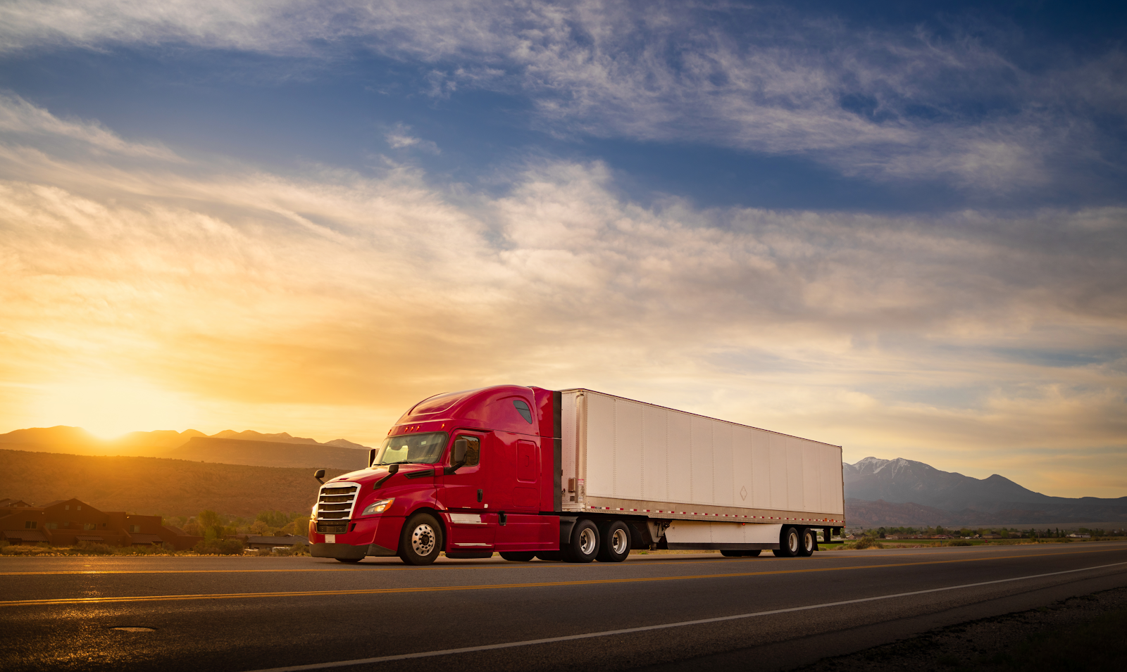 semi truck driving on the road