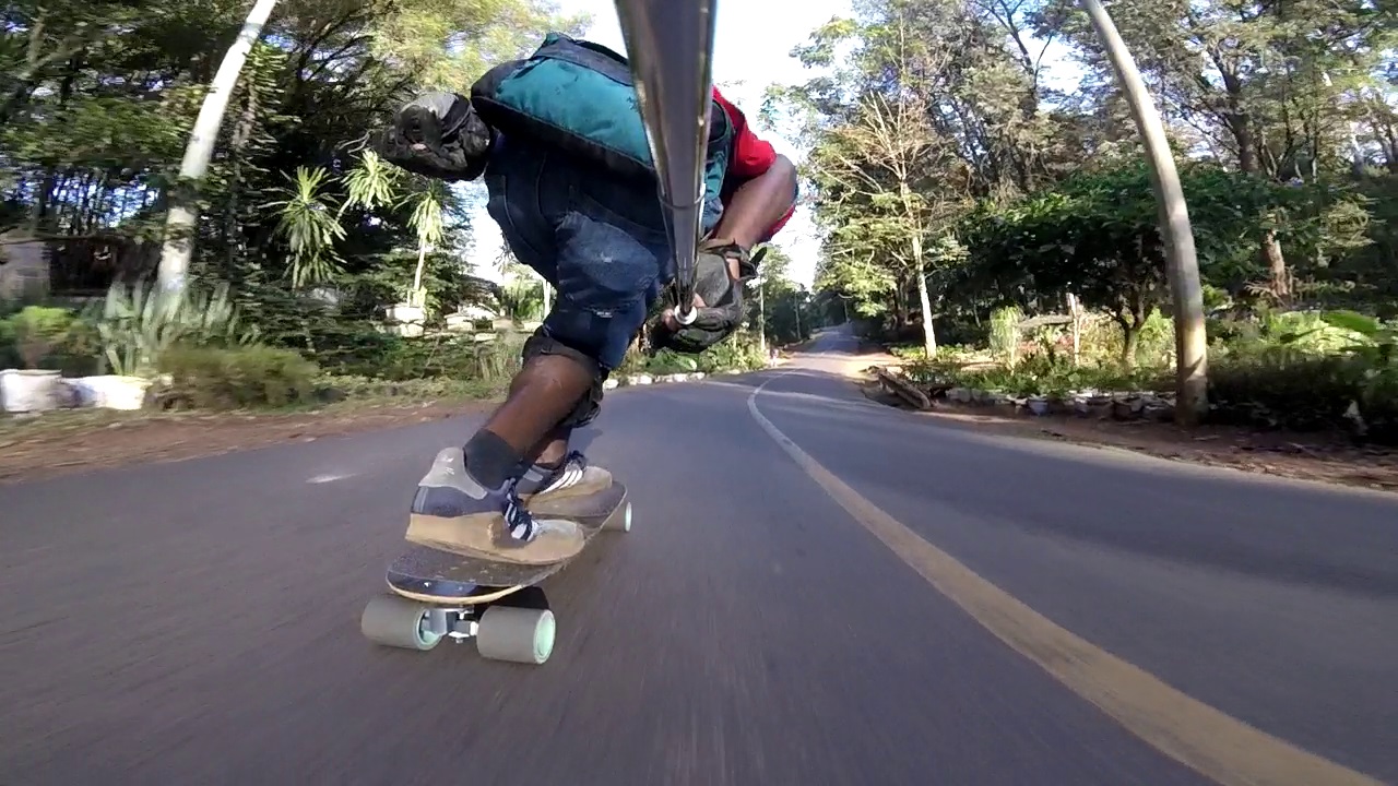 longboarder diving right