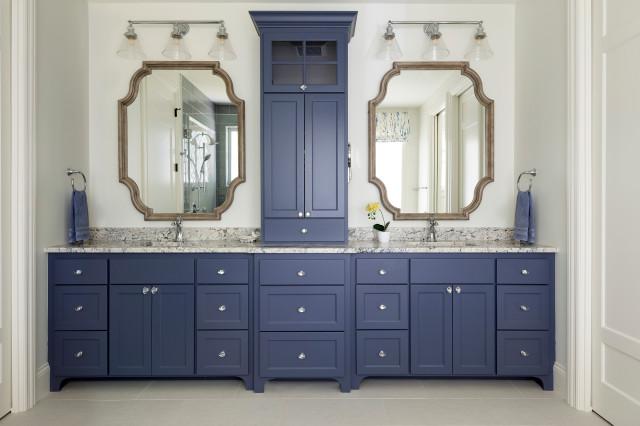 Side by side vanities and heated floors bring together this relaxing primary suite. 