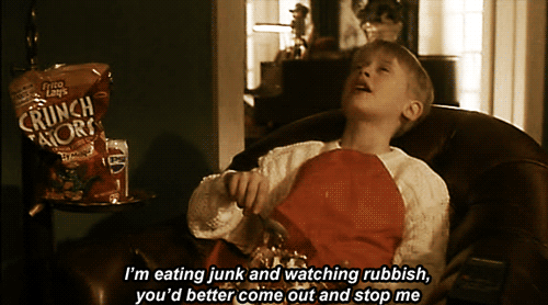 eating junk watching rubbish.gif