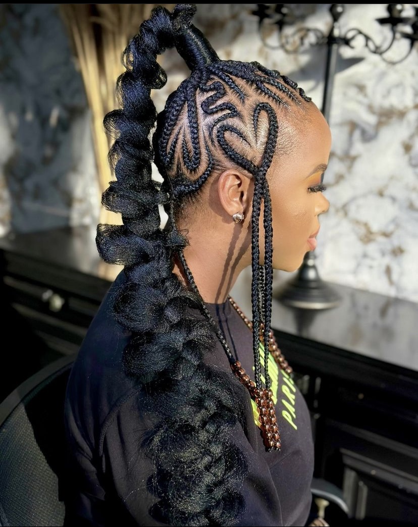 20. Unique Patterned Cornrow with High Ponytail