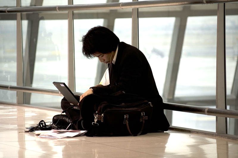 trader banker laptop sleeping bored
