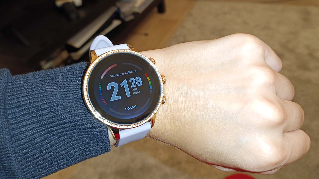 This image shows the Fossil Gen 6 Smartwatch in the hands of human.