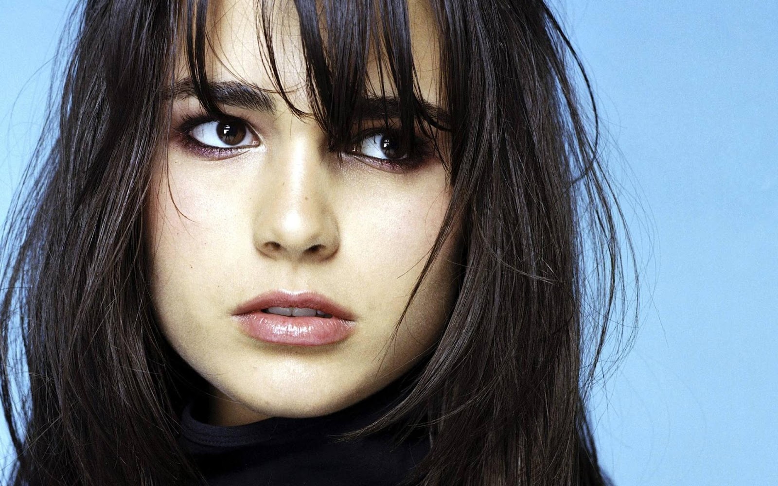 Macintosh HD:Users:nataliewright:Downloads:women-close-up-actress-long-hair-celebrity-jordana-brewster-blue-background-bangs-fresh-hd-wallpaper.jpg