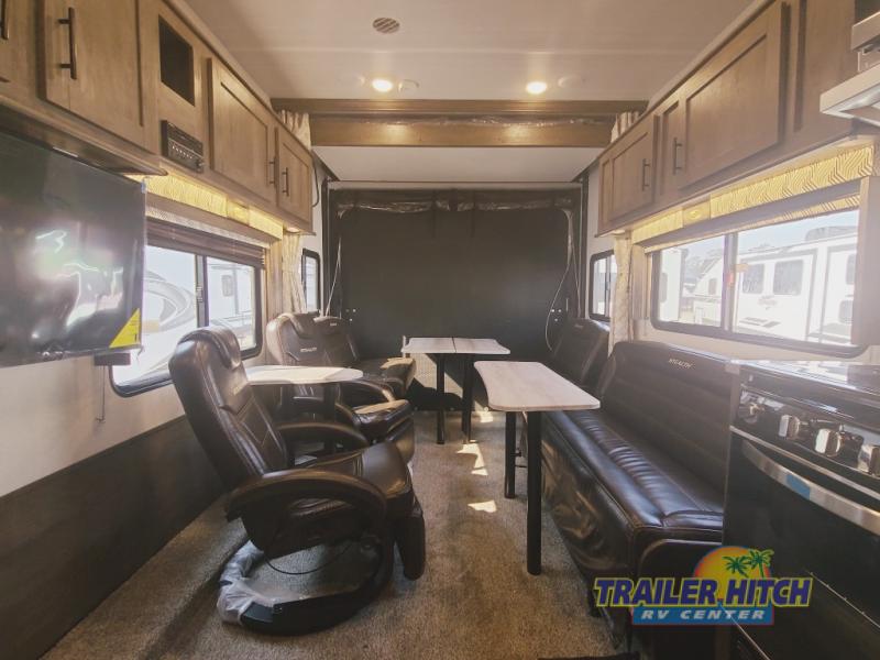 The interior of this toy hauler gives you everything you need for relaxing at the campground.