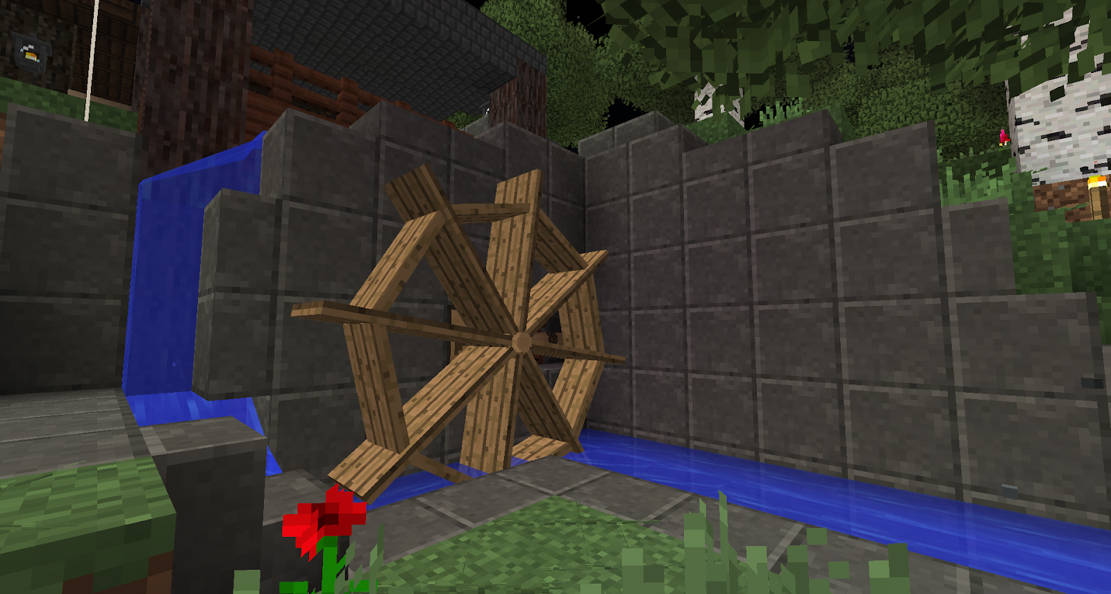 A screenshot showing a wooden watermill being used in the modpack