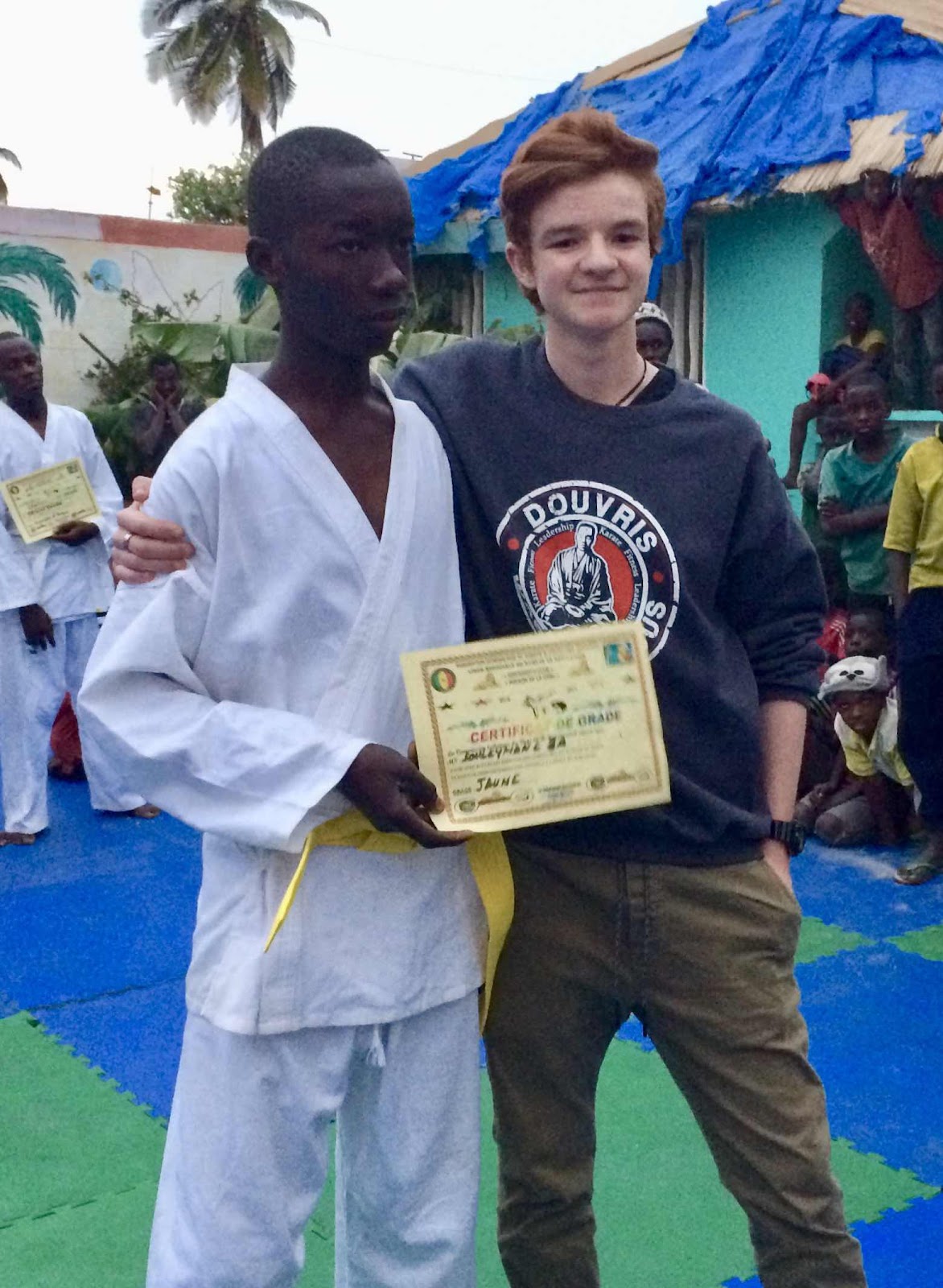 Robbie granting Sulayman his yellow belt
