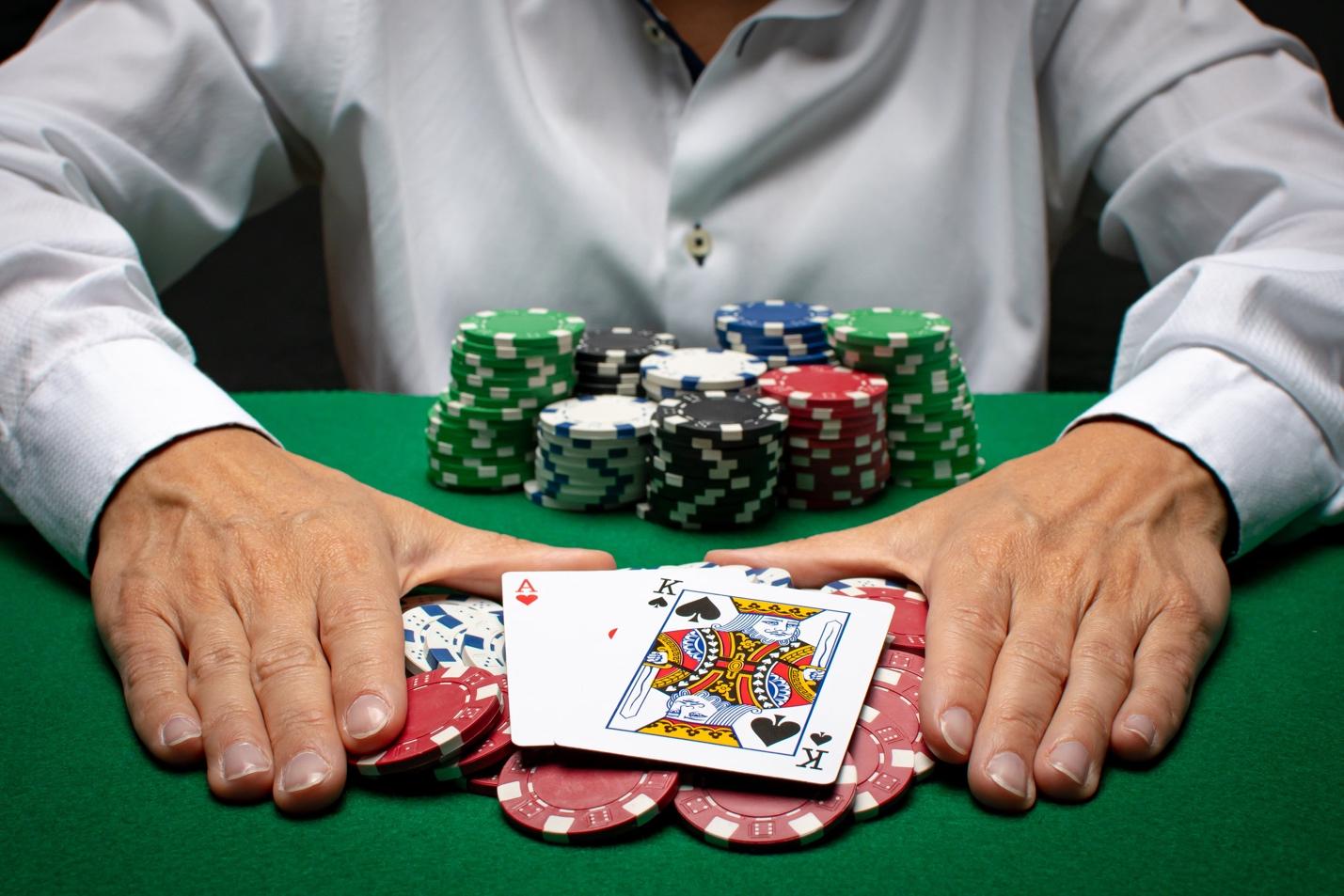 A picture containing text, person, gambling house

Description automatically generated
