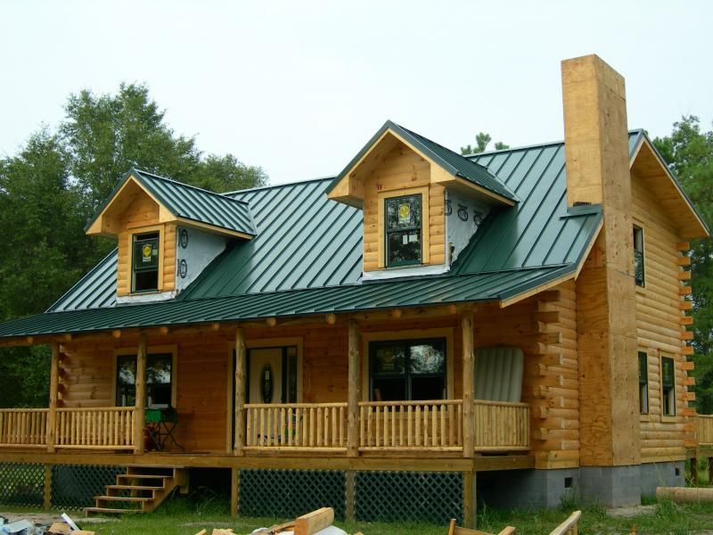 Công trình nhà gỗ sử dụng tấm lợp màu xanh rêu sóng vuông