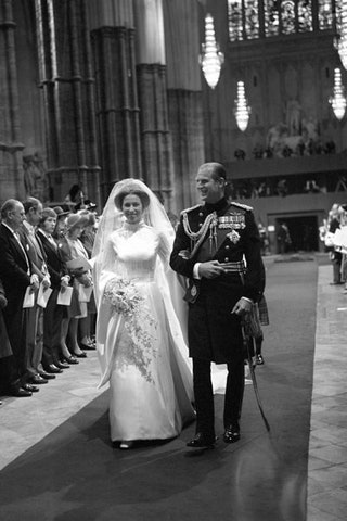 Prince Philip escorts Princess Anne down the aisle of Westminster Abbey 1973