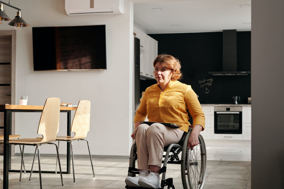 woman in a wheelchair; adapting your home for disability