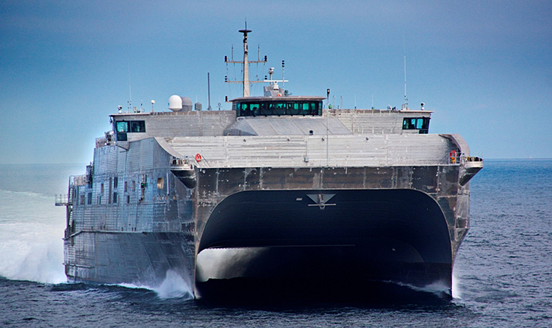 The USNS Spearhead races forward along the water in this file photo.