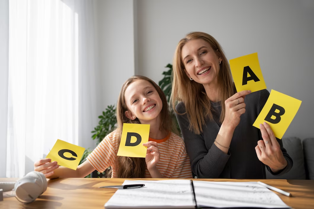 A mother and daughter learning phonics