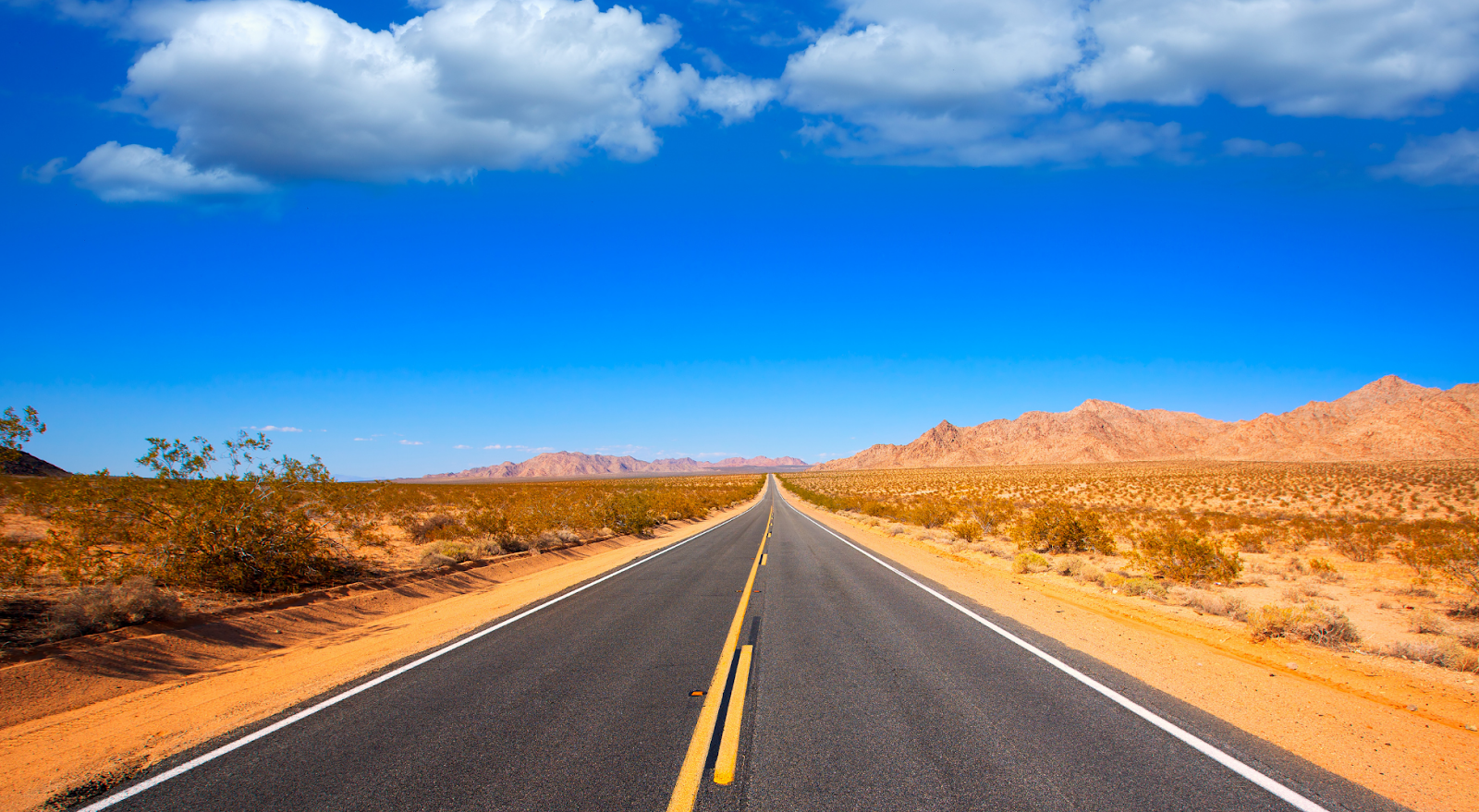 A to Z Bucket List - open road image of Route 66 in the Mohave Desert
