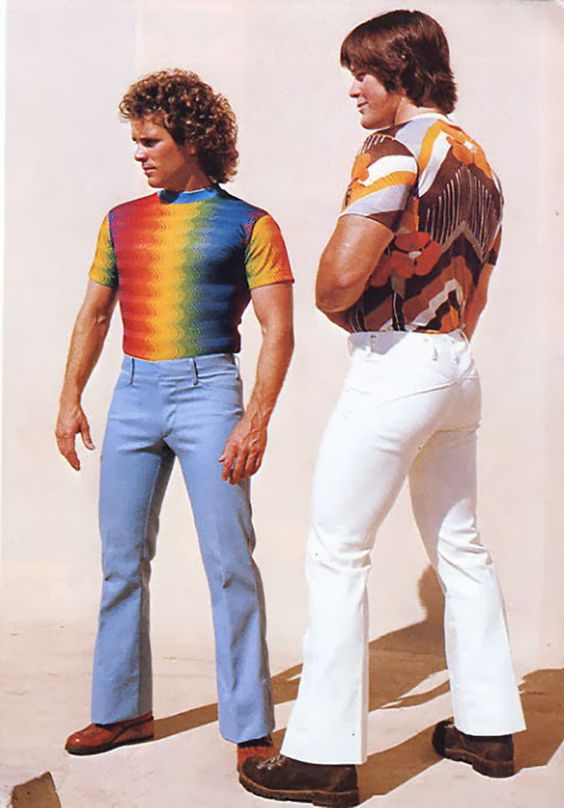 Two 70s men wearing colorful shirts. 