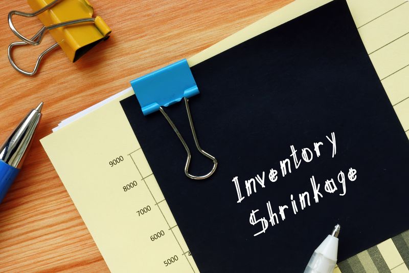 bookkeeping and accounting services - inventory shrinkage written on a black clipped paper