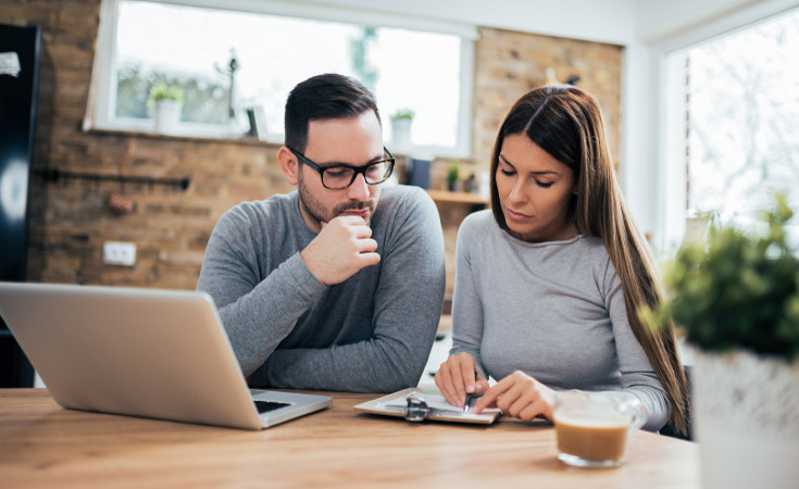 A couple going over their budget together