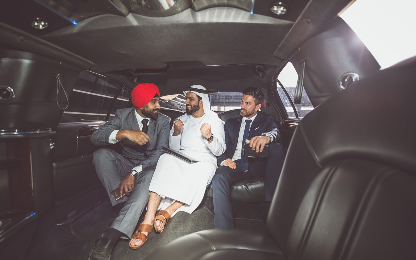 limousine rental in abu dhabi (businessman talking)