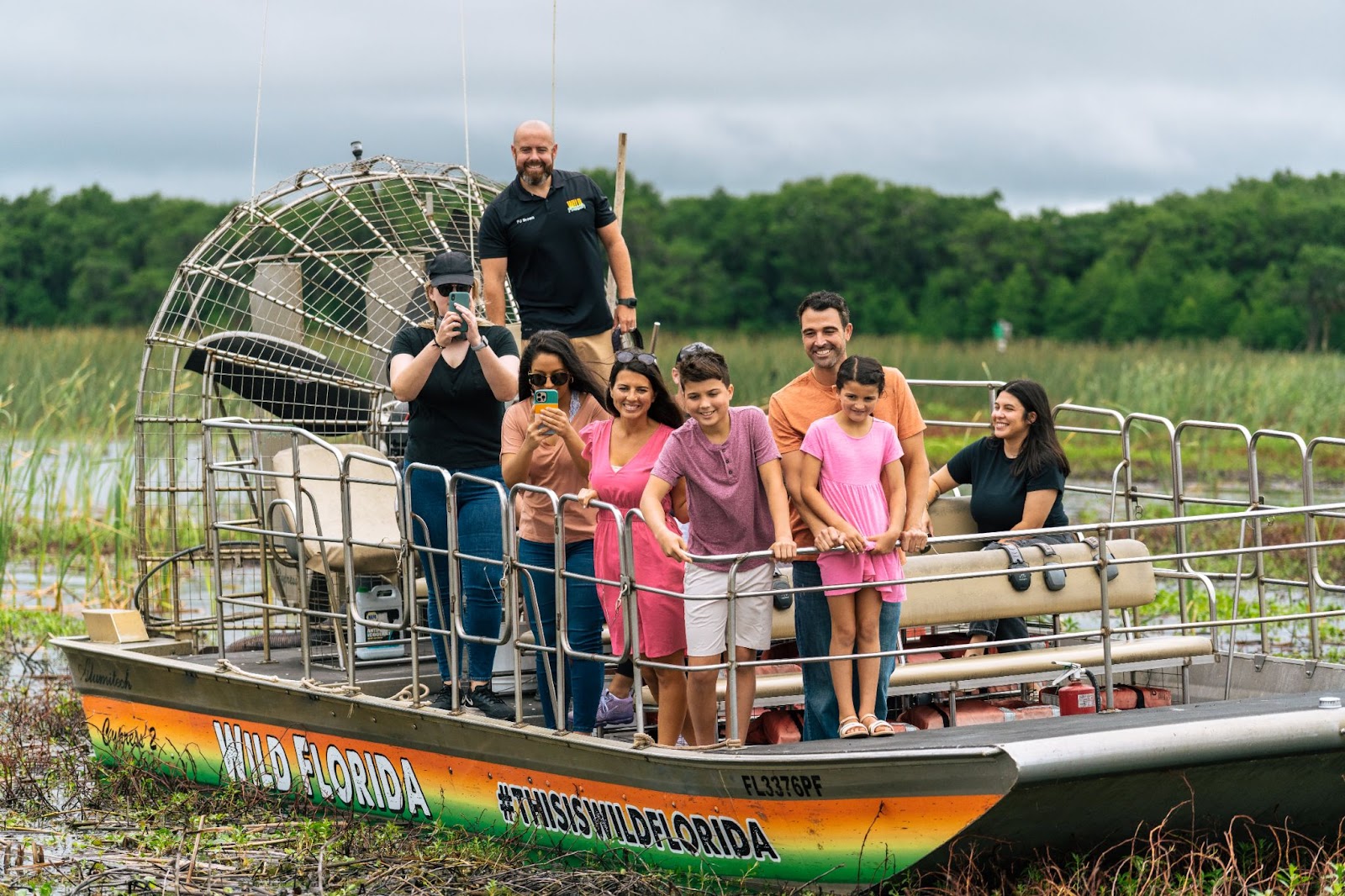 Passengers spotting a gator at Wild Florida