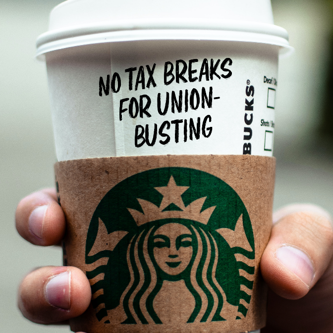 No Tax Breaks for Union-Busting written on a Starbucks Cup