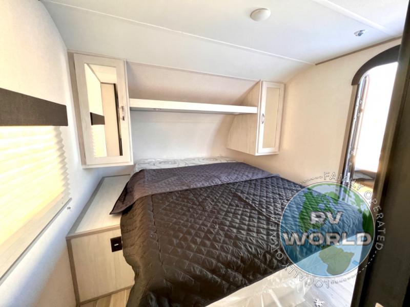 Bedroom in the Prime Time Tracer travel trailer