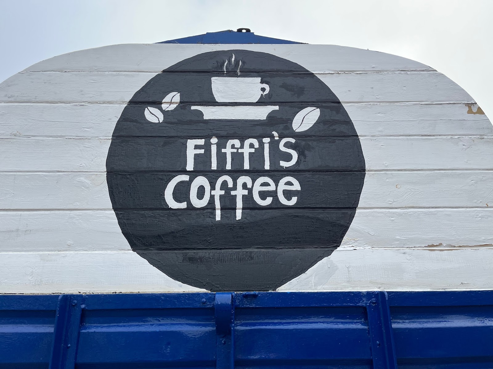 Sign for Fiffi's Coffee in County Donegal; the writing adventurer needs fuel