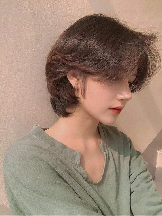 Asian lady with brown short hair