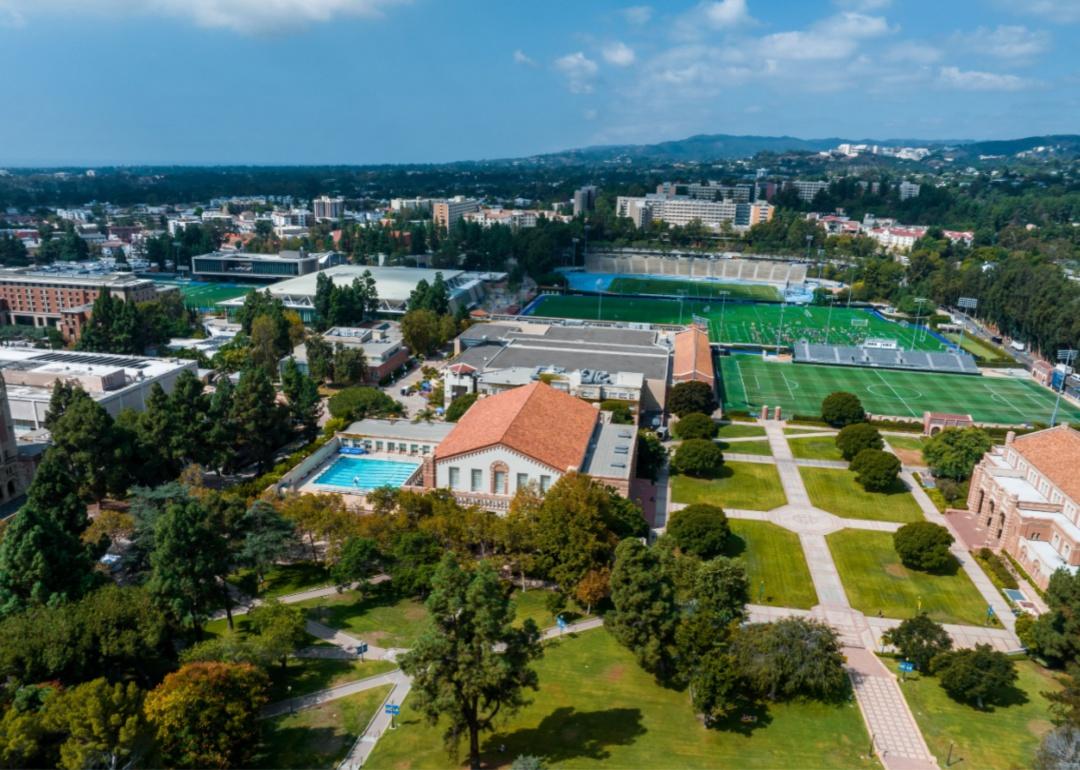 An aerial view of sports fields and buildings on UCLA campus.