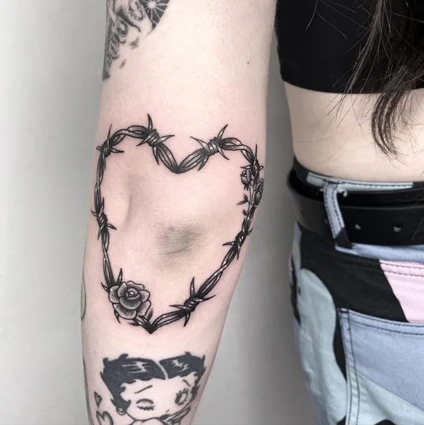 Another picture of the heart barbed wire tattoo