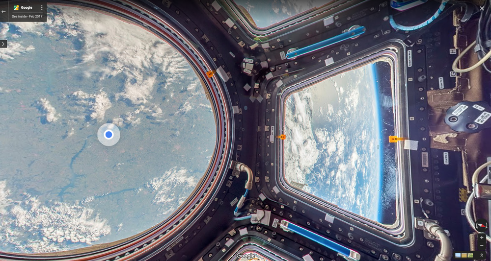 Street View image inside the International Space Station looking down at Earth.