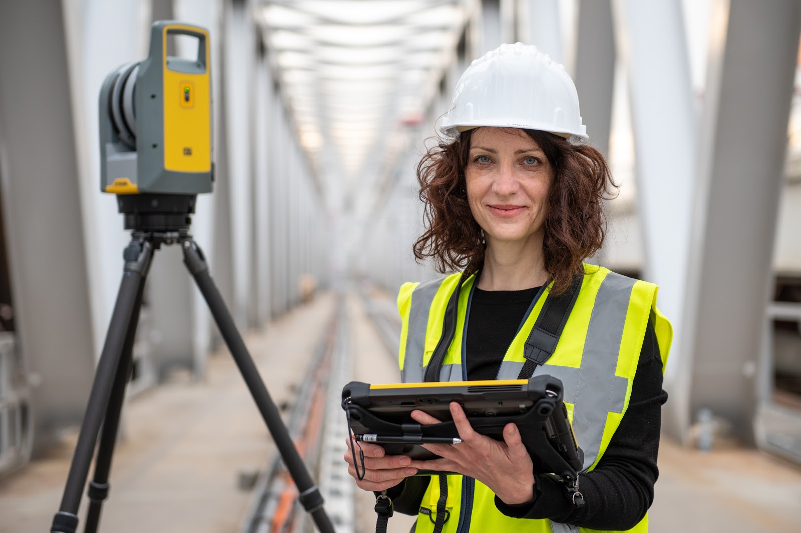 Worker using Trimble technology