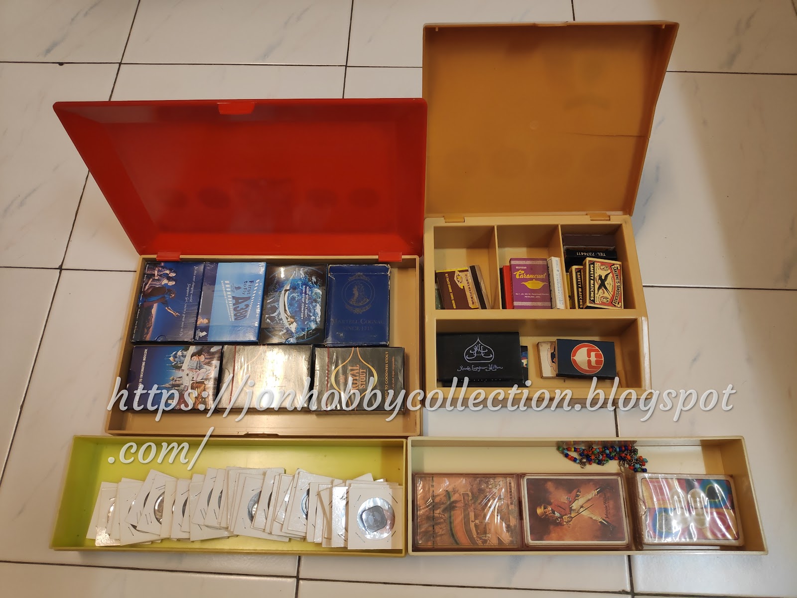 I decided to make full use of my cigarette box collection by placing items inside them