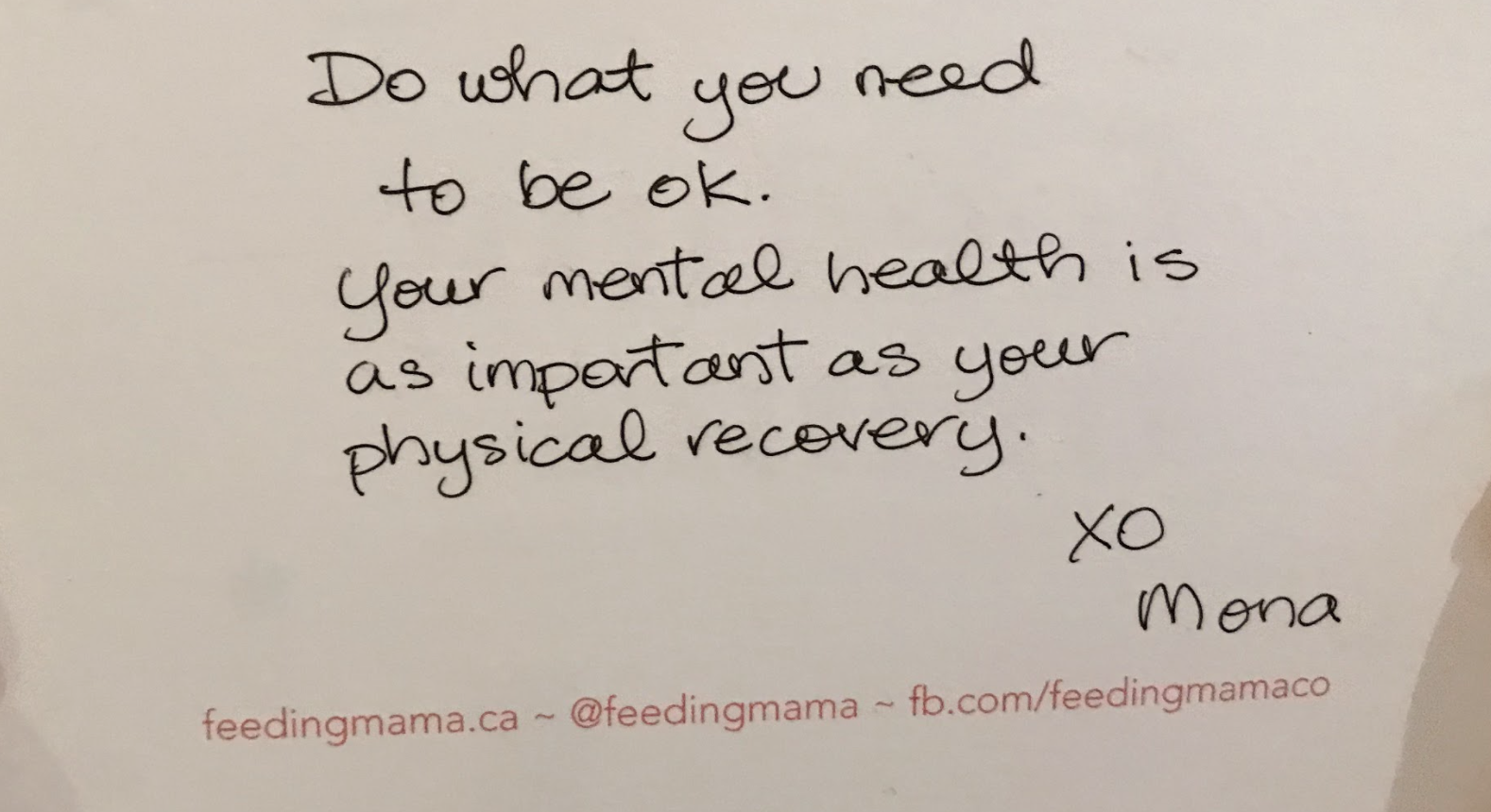 Image of a handwritten note from Feeding Mama to customers receiving meal deliveries. The note reads "Do what you need to be ok. Your mental health is as important as your physical recovery. XO, Mona"