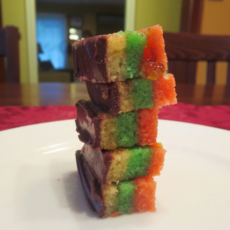 Rainbow Cookies are an almond-paste cookies with a chocolate glaze and moist interior.