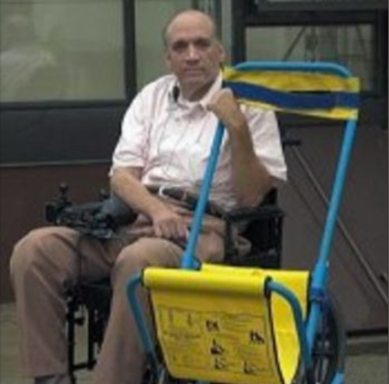John Abruzzo and an Evac Chair