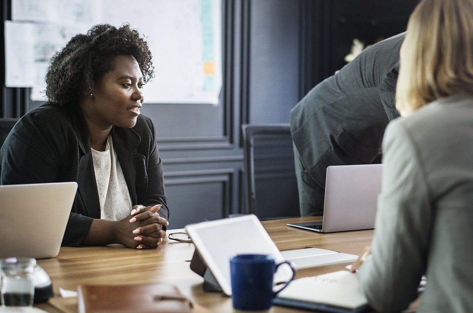 employees conversing about training and development