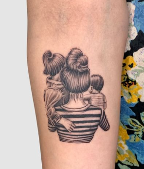 The Mother Lifting A Children’s Tattoo 