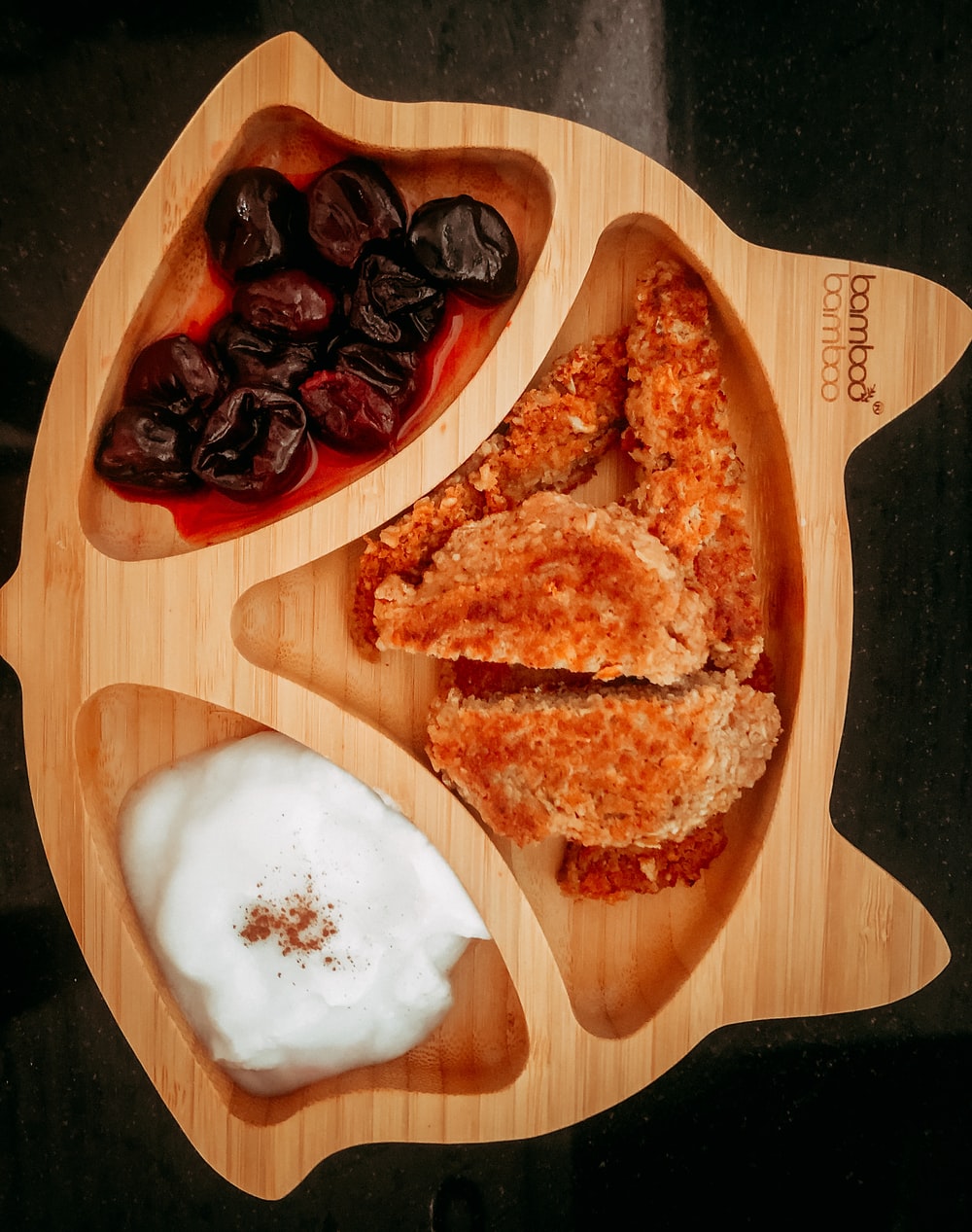 brown bread with white cream on brown wooden chopping board is part of a balanced diet
