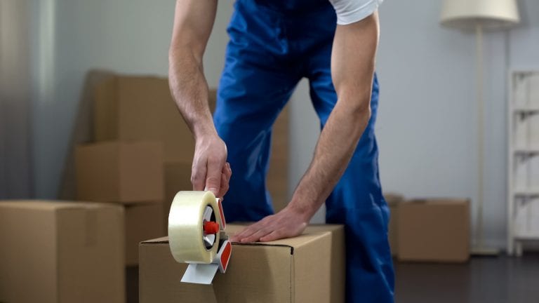 How to Remove Tape Residue After Moving- East Coast West Coast Movers