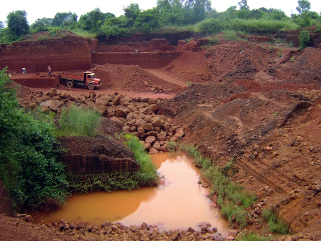 One of hundreds of illegal open-pit iron ore mines in the Bellary District in India that operated with impunity until a 2011 ban put a stop to the practice. Credit: Stella Paul/IPS