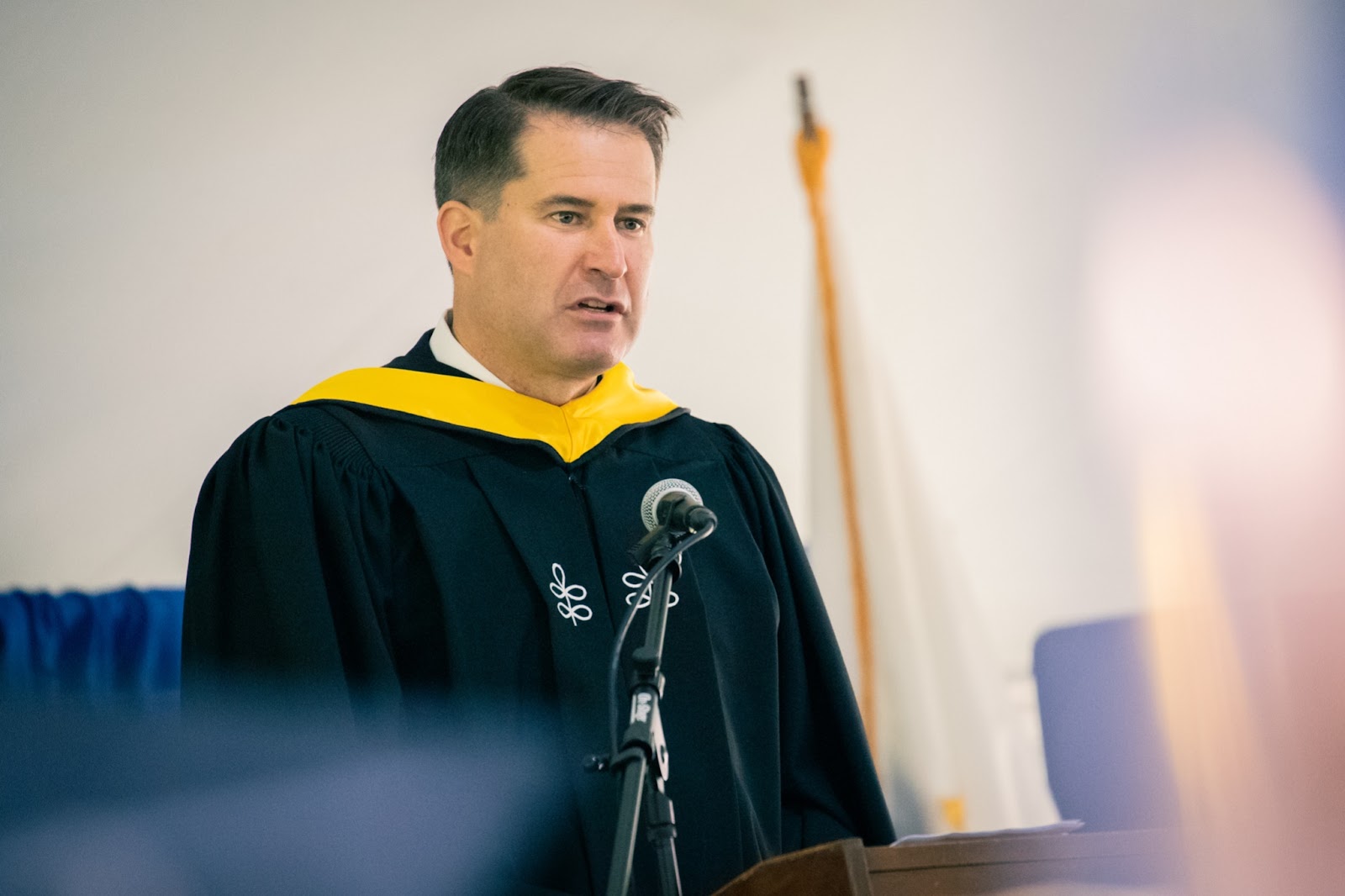 Congressman Seth Moulton delivering his commencement address 