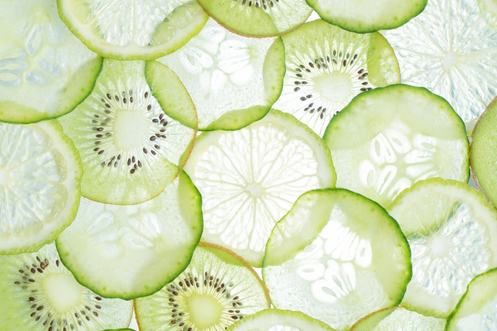 sliced fruit circles in water, cucumber, kiwi, lemon, summer, health, hydration, 