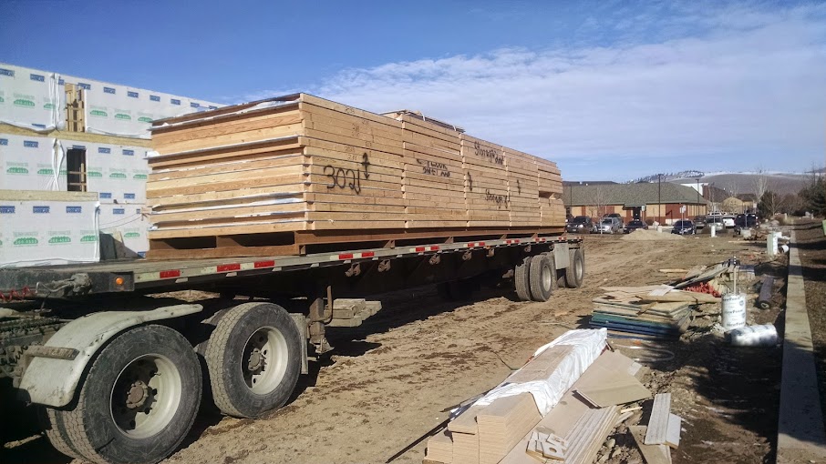 flatbed loaded with prefab walls