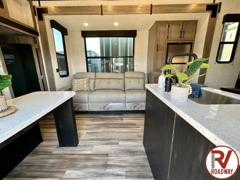 You will love this luxury toy hauler fifth wheel that’s perfect for family vacations.