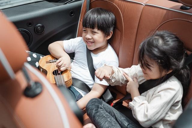 Kids laughing in a car