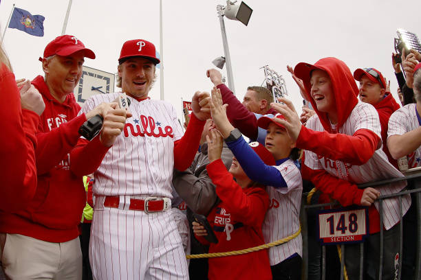 Bryson Stott of the Philadelphia Phillies is interviewed and greets fans against the Cincinnati Reds at Citizens Bank Park on April 07, 2023 in...