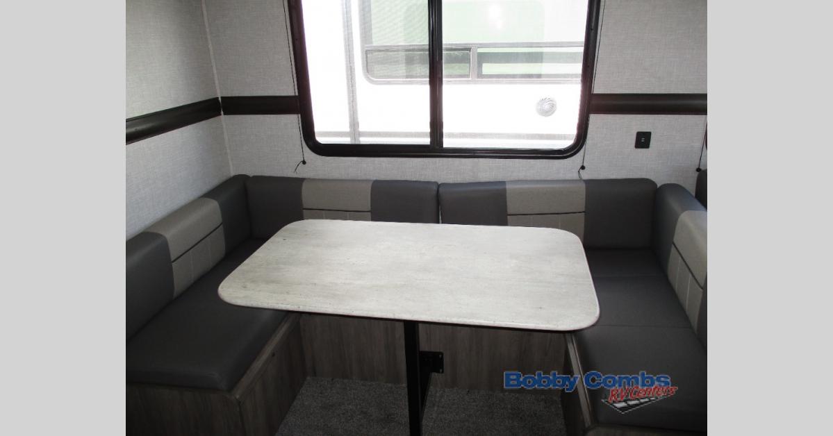 U-shaped dinette in a CrossRoads Zinger lite travel trailer